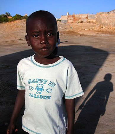 13 Sudanese boy in Happy in Paradise T-shirt, Suakin, Sudan